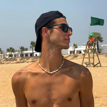 Peñarronda · black sunglasses with green polarized lenses