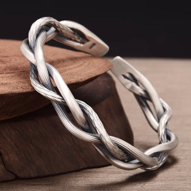 Pulseira Stroke · Pulseira rígida entrançada aberta