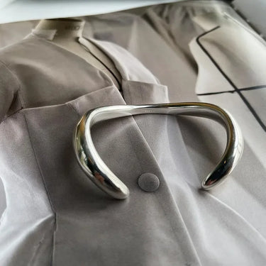 Sollo Bracelet · Open rigid bracelet