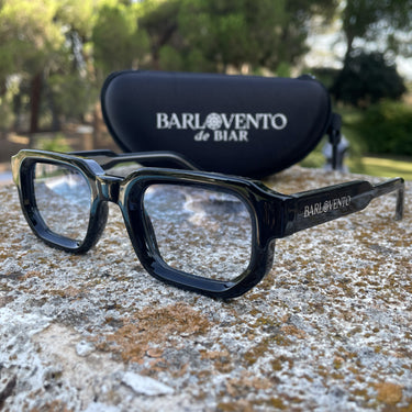 Genovenses · striking black sunglasses with blue lenses