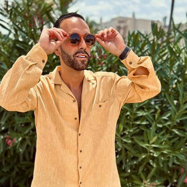 Gulpiyuri · gafas de sol de color naranja cristal