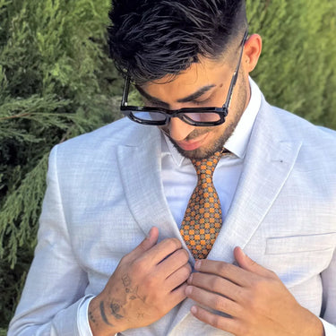 Genovenses · striking black sunglasses with blue lenses