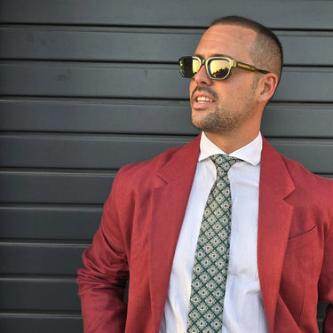 Portet · Striking green sunglasses with black UV400 lenses