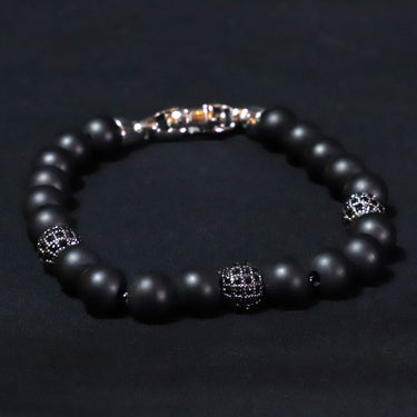 Pulseira Andro · Pulseira de contas em aço inoxidável e cobre