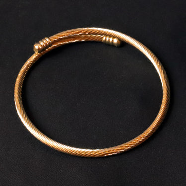 Pulseira Carme · Pulseira rígida em ouro 18k