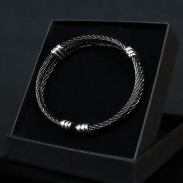 Pulseira Leptus · Pulseira rígida aberta em preto e prateado