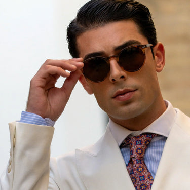 Torimbia · round orange crystal sunglasses with brown lenses