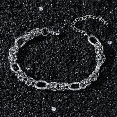 Pulsera Ofiuco · Pulsera de titanio expandible con patrón geométrico