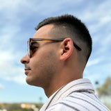 Torimbia · gafas de sol redondas de color naranja cristal con lentes marrones - Barlovento de Biar