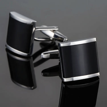 Algol · silver and black cufflinks