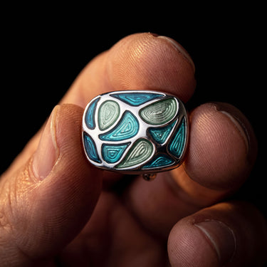 Arcturus · gemelos de color plata verde y azul