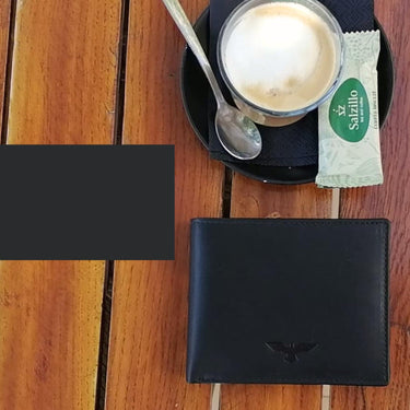 Lausanne · Billetera clásica de piel en color negro y camel con cremallera