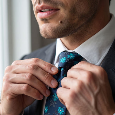 Brunneras Blue and Cyan Floral Tie Set with Handkerchief, Cufflinks, and Bow Tie
