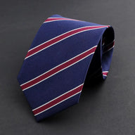 Cheltenham · Corbata azul marino 100% seda con rayas granates y blancas