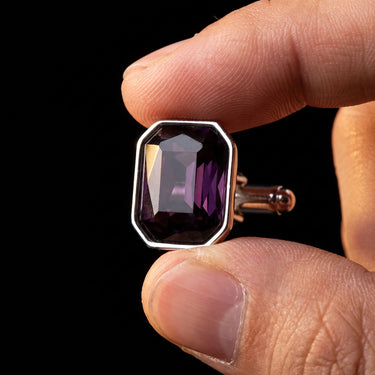 Eta · cufflinks with purple stone
