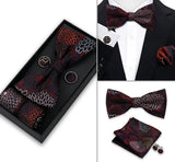 Fénix · conjunto de pajarita negra y roja con flores de plumas - Barlovento de Biar