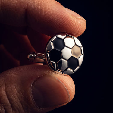 Fútbol · gemelos con forma de balón de fútbol