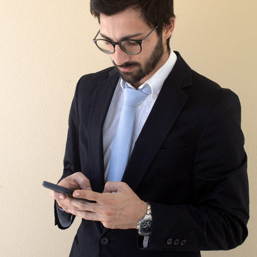 Gibson · soft light blue tie