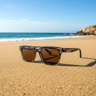 Illetes · gafas de sol de color marrón grisáceo cristalino con lentes marrones