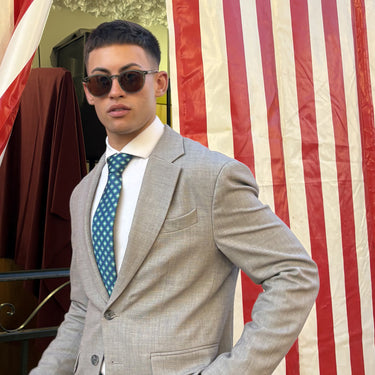 Marinella · corbata estilo italiano azul marino con flores verdes