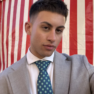 Marinella · corbata estilo italiano azul marino con flores verdes