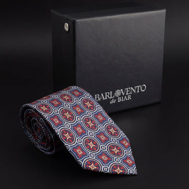 Matera · corbata estilo italiano azul marino con medallones rojos y dorados