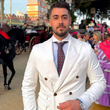 Matera · corbata estilo italiano azul marino con medallones rojos y dorados