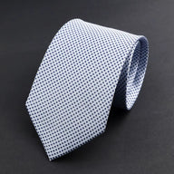 Procida · corbata de 100% seda blanca con micro cuadros azul marino