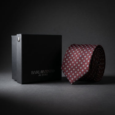 Sciacca · corbata granate con estampado floral azul y amarillo