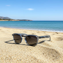 Silencio · gafas de sol redondas de cristal oscuro