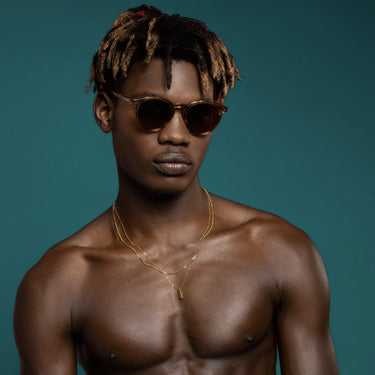 Torimbia · gafas de sol redondas de color naranja cristal con lentes marrones