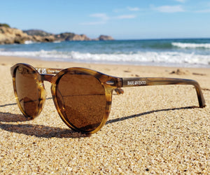 Torimbia · gafas de sol redondas de color naranja cristal con lentes marrones