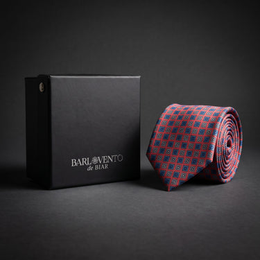 Urbino · corbata estilo italiano rojo coral con detalles en azul cobalto, celeste y crema